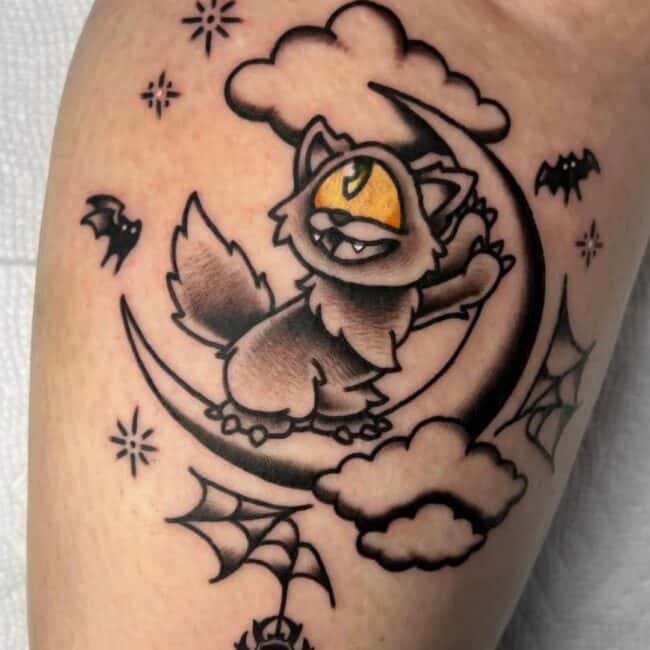 Anime Cartoon Neopets Raccoon Standing on Moon With Clouds in The Background Stars Bats Spider Forearm Tattoo