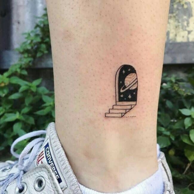 Black and Grey Doorway Universe Stars Saturn Meteors Leg Ankle Tattoo