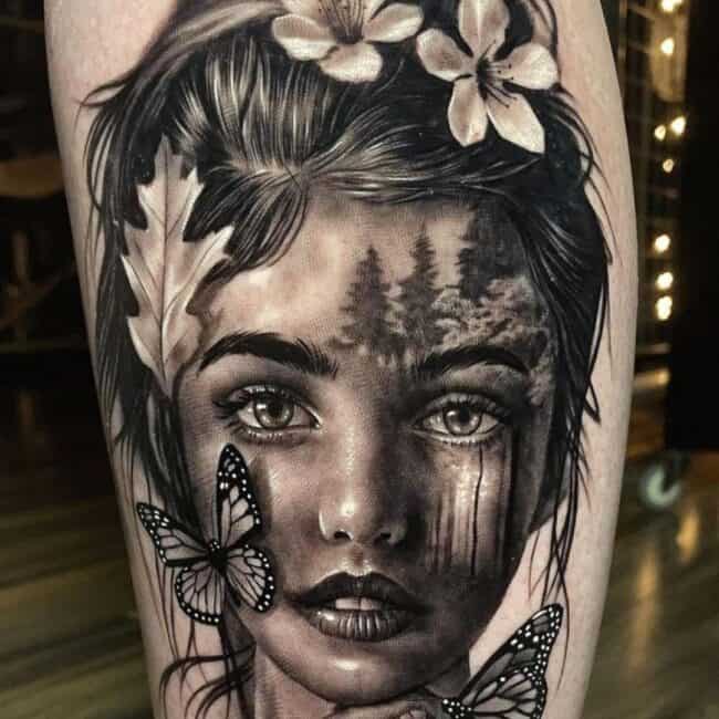 Black and Grey Realism Portrait Girl Head Butterfly Flowers Tree Leaves Nature Leg Calf Tattoo