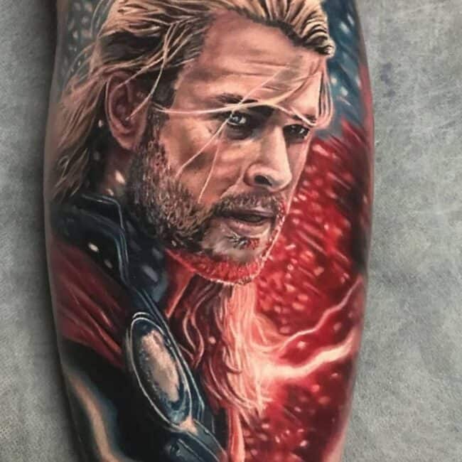 Colour Realism Thor Chris Hemsworth Portrait Dramatic Pose Abstract Energetic Background Forearm Tattoo