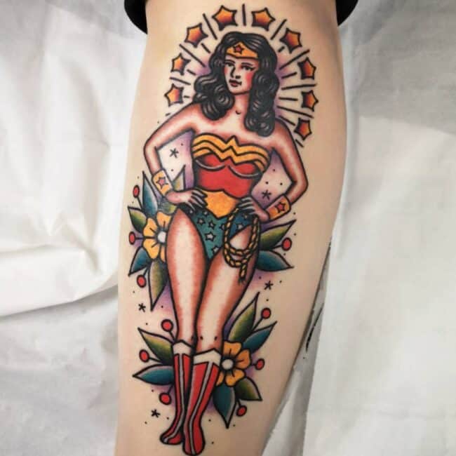 Colour Traditional Wonder Woman Floral Patterns in the Background Forearm Tattoo