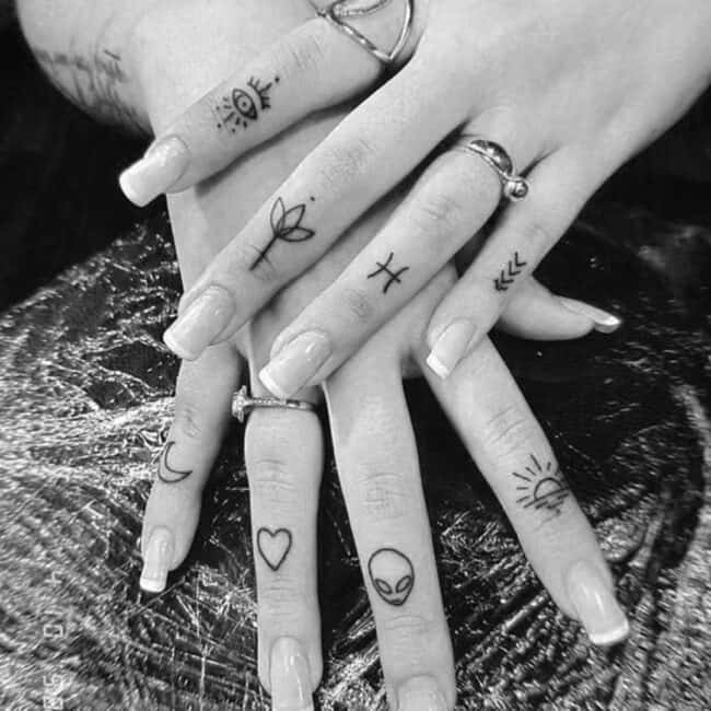 Fine Line Black and Grey Minimalist Flower Lotus Pisces Sunrise Moon Heart Evil Eye Alien Arrow Hand Finger Tattoo