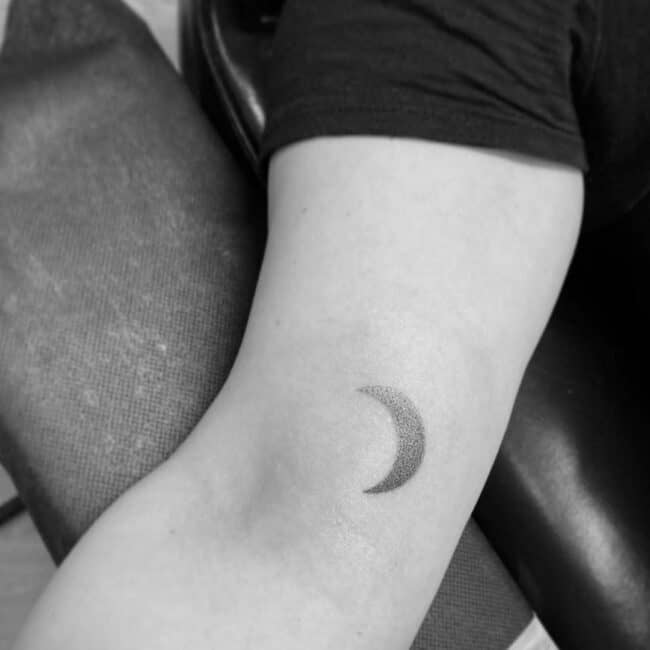 Fine Line Dotwork Black and Grey Crescent Moon Arm Tattoo