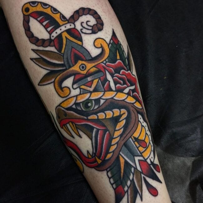 Traditional Colour Dagger Cutting Coiled Snake Fangs Forked Tongue Rose Forearm Tattoo