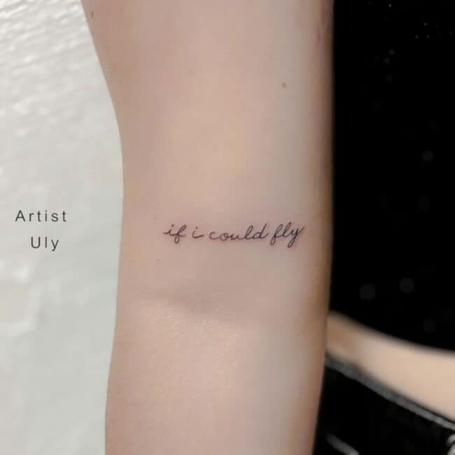 Uly Tattoo Artist Fine Line Black and Grey Minimalist Handwritten Script Cursive Lettering Design Forearm Tattoo