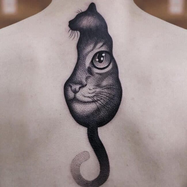 Black and Grey Realism Full Body Cat Within Its Shape There Is Detailed Head of a Cat Curved Shape Eye Whiskers Nose Mouth Upper Back Tattoo