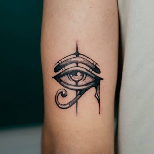 Black and Grey Fine Line Traditional Eye of Horus Ancient Egyptian Symbol Detailed Shading Iris Sharp Arrow Bold Eyebrow Forearm Tattoo