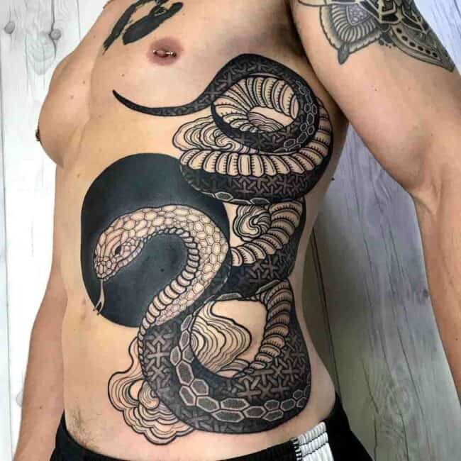 Black and Grey Fine Realism Geometric Blackwork Whole Body Snake Sharp Fangs Tongue Mouth Head Eye Body Tail Sternum Rib Tattoo