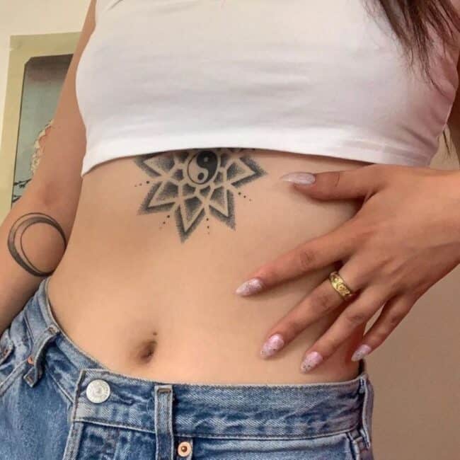 Black and Grey Geometric Mandala Yin Yang Star Detailed Dots Shading Symmetrical Patterns Below Chest Sternum Abdomen Tattoo