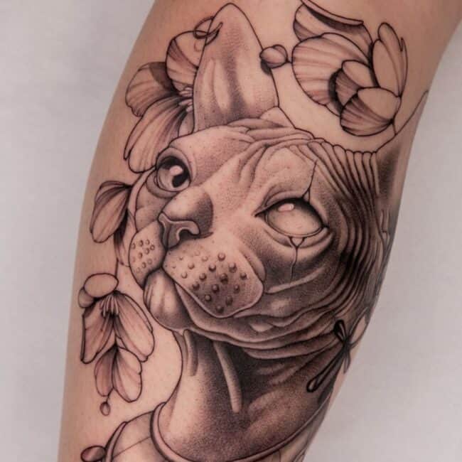 Black and Grey Realism Fineline Geometric Bastet Cat Sphinx Goddess Portrait Ancient Egyptian Symbol Detailed Eye Ears Flowers Blooms Petals Ornate Collar Arm Forearm Tattoo