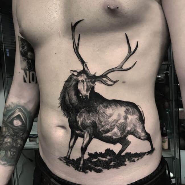 Black and Grey Realism Whole Body Deer Elk Wapiti Detailed Horns Eye Nose Ear Four Legs Grass Torso Rib Tattoo