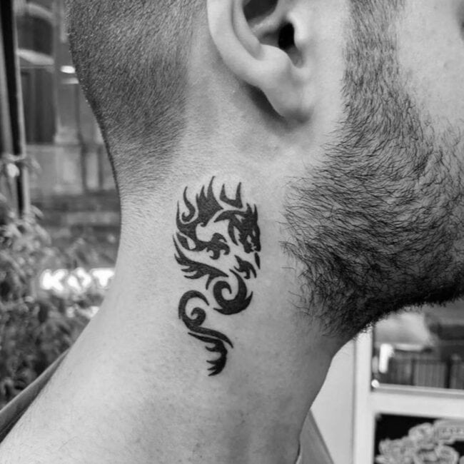 Blackwork Minimalist Tribal Dragon Geometric Body Design Sharp Edges Tails Claws Paw Eye Teeth Spine Neck Tattoo