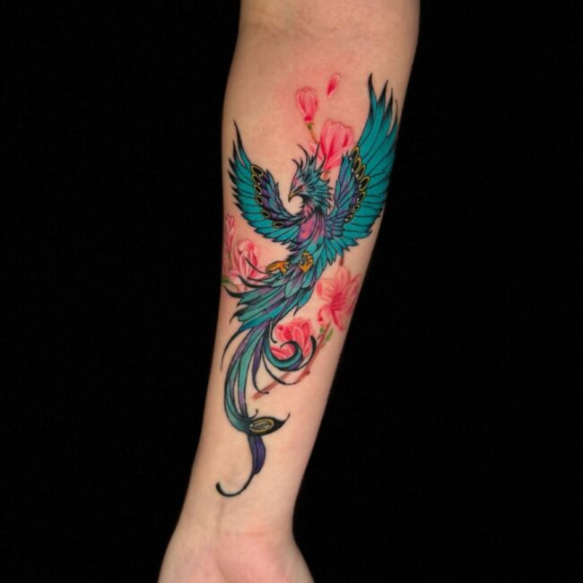 Colour Cartoon Anime Whole Body Phoenix Pointed Beak Glowing Eye Crest Wings Tail Sharp Talons Nails Leg Feet Flowers Shoulder Forearm Tattoo