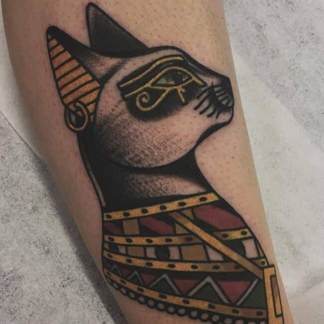 Colour Realism Fineline Geometric Bastet Cat Goddess Portrait Ancient Egyptian Symbol Eye of Horus Detailed Ears with Piercing Nose Whiskers Leg Calf Tattoo