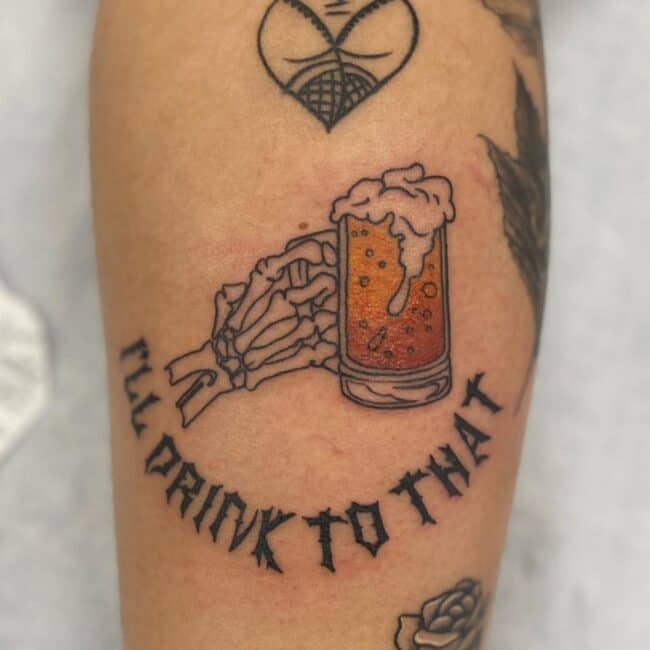 Colour Script Lettering Fine Line Skeleton Hand Glass Beer Bubbles Flowing Forearm Tattoo