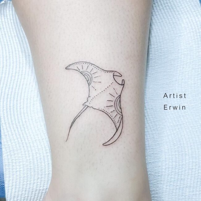 Erwin Tattoo Artist Minimalist Fine Line Manta Ray with Defined Mouth Claspers Flowing Tail Graceful Fins and Sun Element on Wing Leg Tattoo