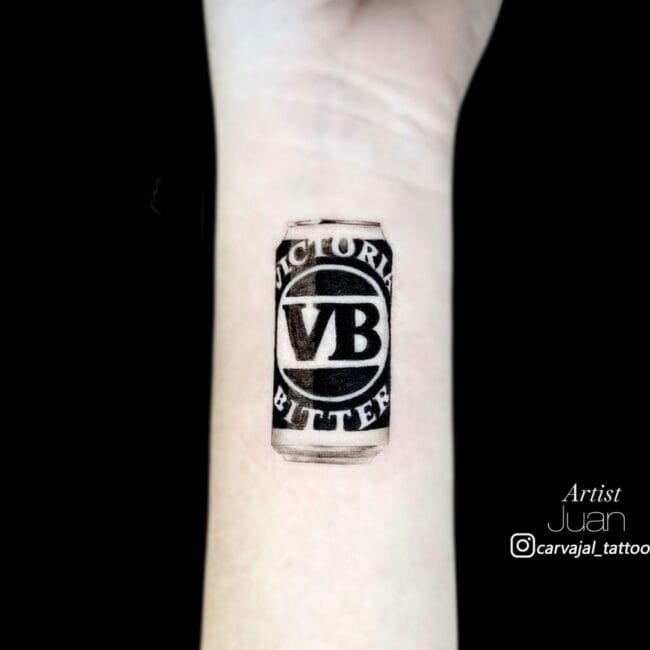Juan Tattoo ArtistScript Lettering Blackwork Fine Line Realism Beer Can Victoria Bitter VB Circle Logo Forearm Tattoo