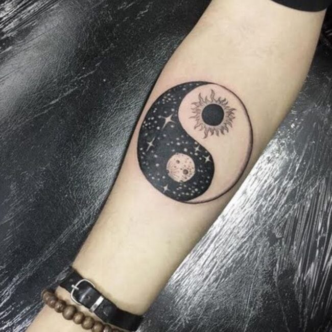Traditional Black and Grey Yin Yang Sun Radiating Lines Detailed Full Moon Starry Night Meteors Forearm Tattoo