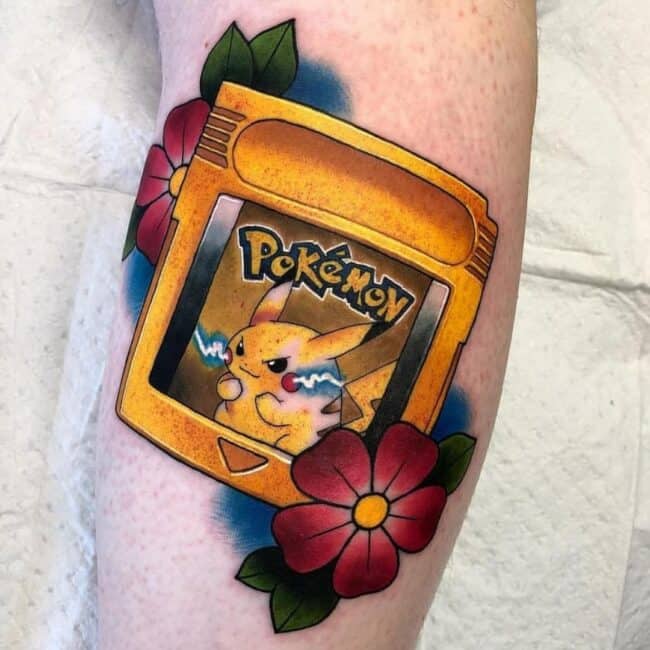 Traditional Colour Anime Cartoon Pikachu Gameboy Cartridge Round Red Electric Cheek Sharp Eyes Pointed Ears Lightning Bolt Tail Forearm Tattoo