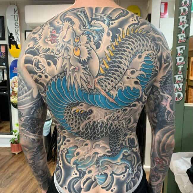 Traditional Japanese Colour Full Body Dragon Sharp Claws Paws Teeth Horns Scales Neck Detailed Eyes Mouth Nose Whiskers Wave Pattern Arm Sleeve Back Tattoo