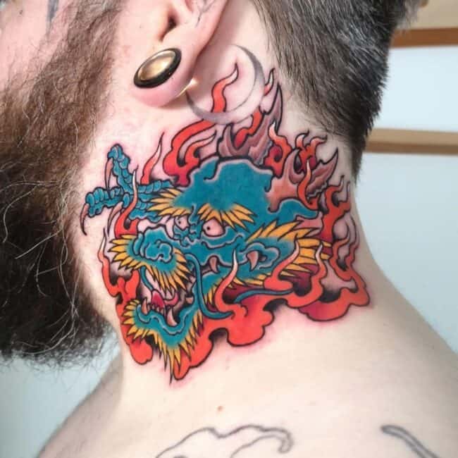 Traditional Japanese Colour Irezumi Portrait Dragon Sharp Claws Paws Teeth Horns Scales Burning Flames Neck Tattoo