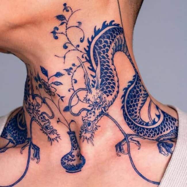 Traditional Japanese Realism Blue Dragon Sharp Claws Paws Teeth Horns Detailed Belly Eyes Nose Scales Leaves Flowers Vase Long Stems Shoulder Neck Tattoo