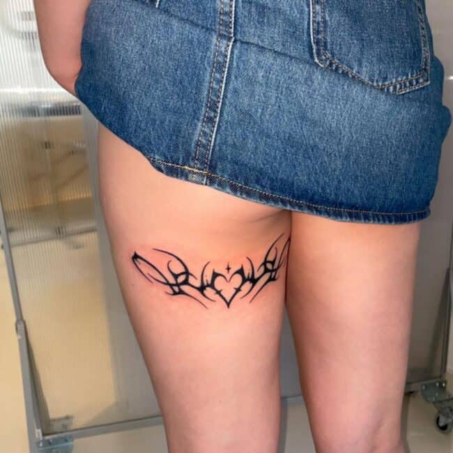 Tribal Blackwork Minimalist Geometric Abstract Sharp Edges Thick and Thin Bold Line Heart Shape Patterns Curved Flow Sign Back Leg Thigh Tattoo