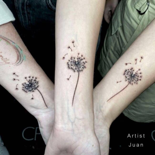 Black and Grey Realism Fine Line Detailed Whole Dandelions Flying Petals Stem Flower Matching Forearm Tattoo