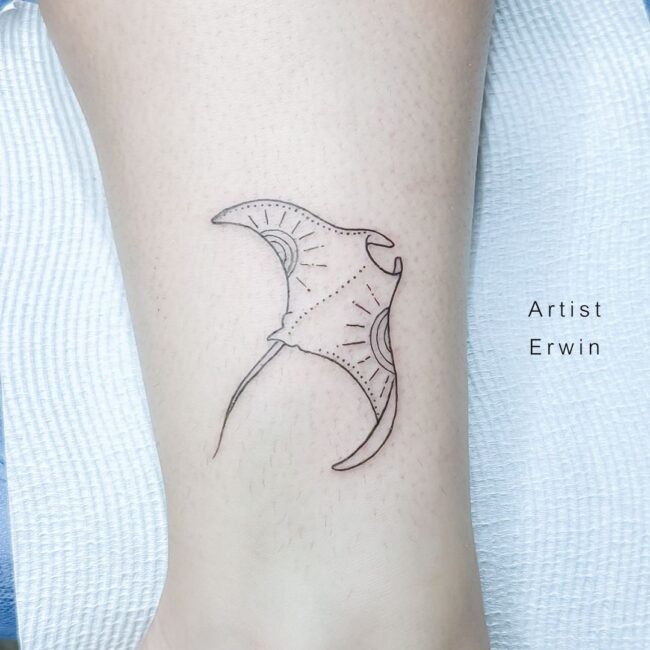 Erwin Tattoo Artist Minimalist Fine Line Geometric Manta Ray with Defined Mouth Claspers Flowing Tail Graceful Fins and Sun Element on Wing Leg Tattoo