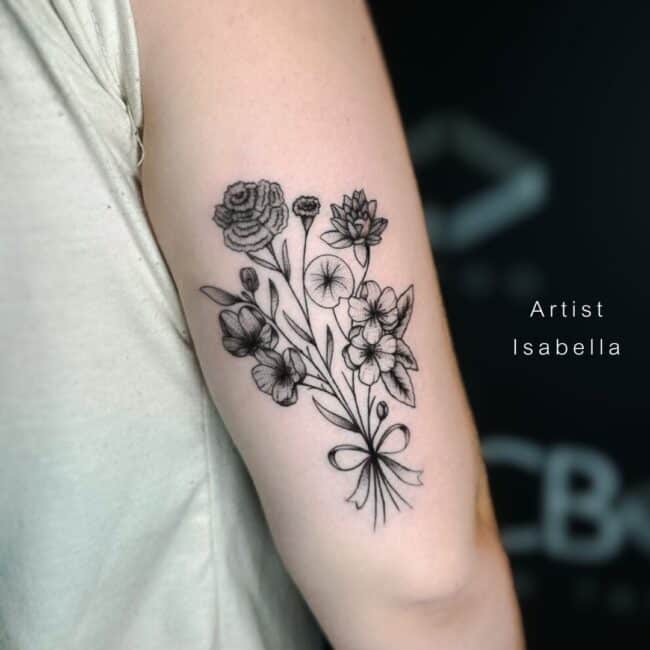 Isabella Tattoo Artist Black and Grey Realism Fine Line Adorable Whole Flowers Bouquet Ribbon Sepal Stem Leaves Petals Arm Tattoo