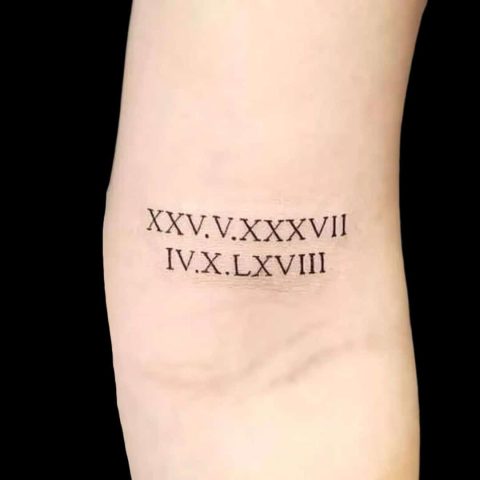 Small Roman Numerals Arm Tattoo
